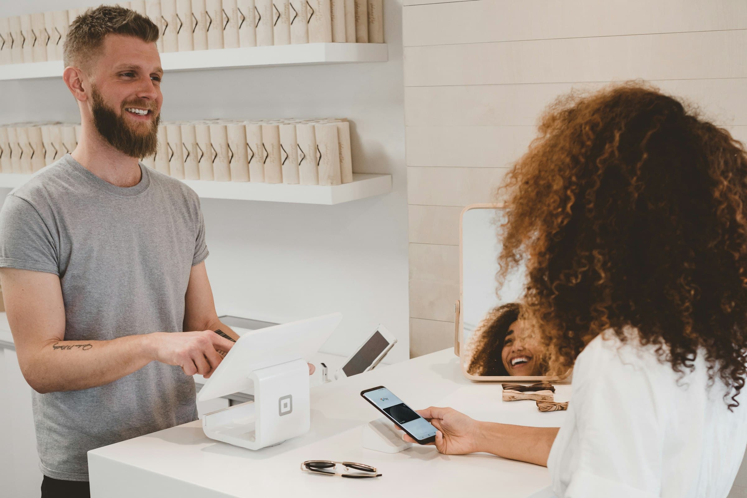 A checkout at a counter — the return is in the order, not in the framework debate