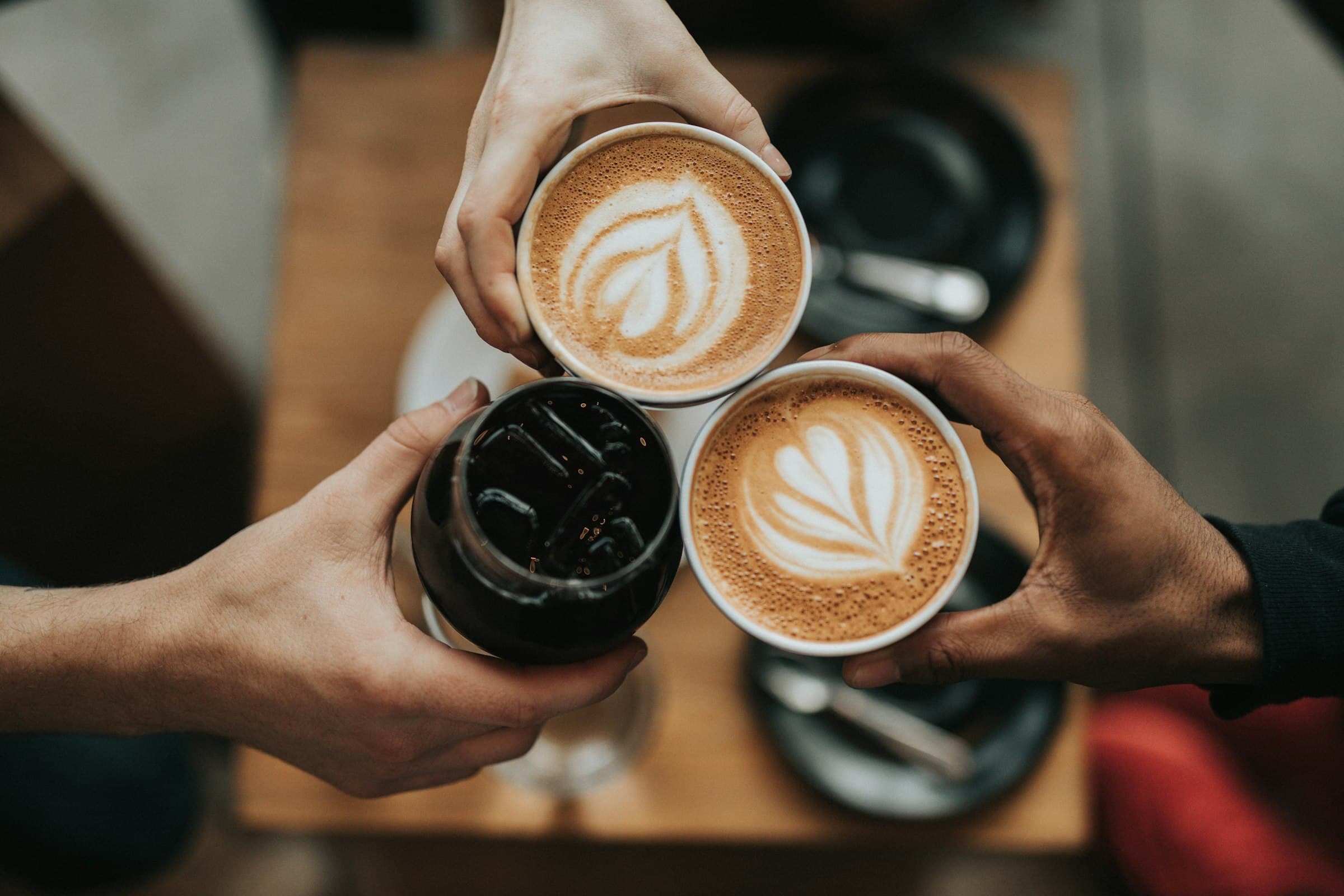 A coffee service — the ticket often starts on a phone, not at the till