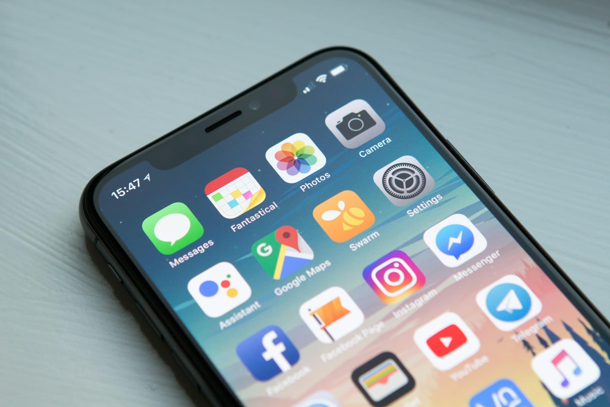A phone in hand — the product has to work here, not in a framework debate