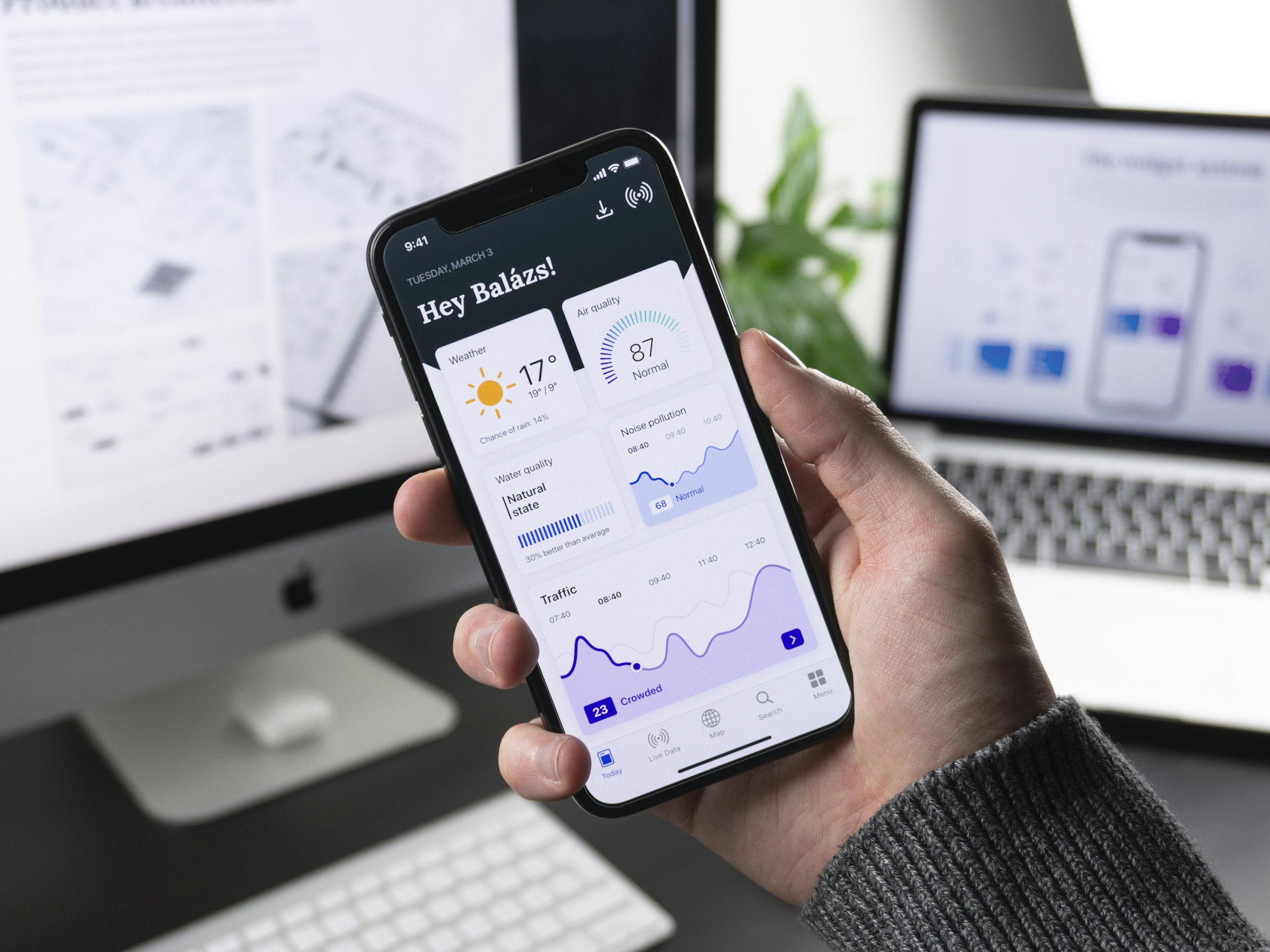 A phone showing a dense product UI — consistency across platforms is a product choice